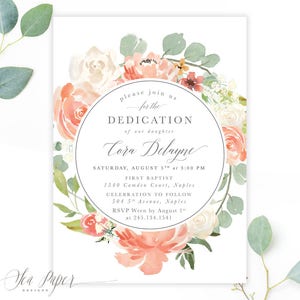 May include: A floral-themed invitation for a baby dedication ceremony. The invitation features a watercolour wreath of peach and white flowers with green leaves. The text reads "Please join us for the dedication of our daughter Cora Delayne. Saturday, August 5th at 3:00 PM. First Baptist, 1540 Camden Court, Naples. Celebration to follow 504 5th Avenue, Naples. RSVP Wren by August 1st at 245.134.1541."