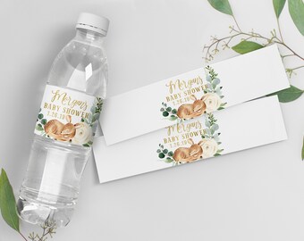 May include: A clear plastic water bottle with a custom label reading "Morgan's Baby Shower 1.26.19". The label features a watercolour illustration of a fawn, white roses, and green foliage. Two additional labels are also visible.