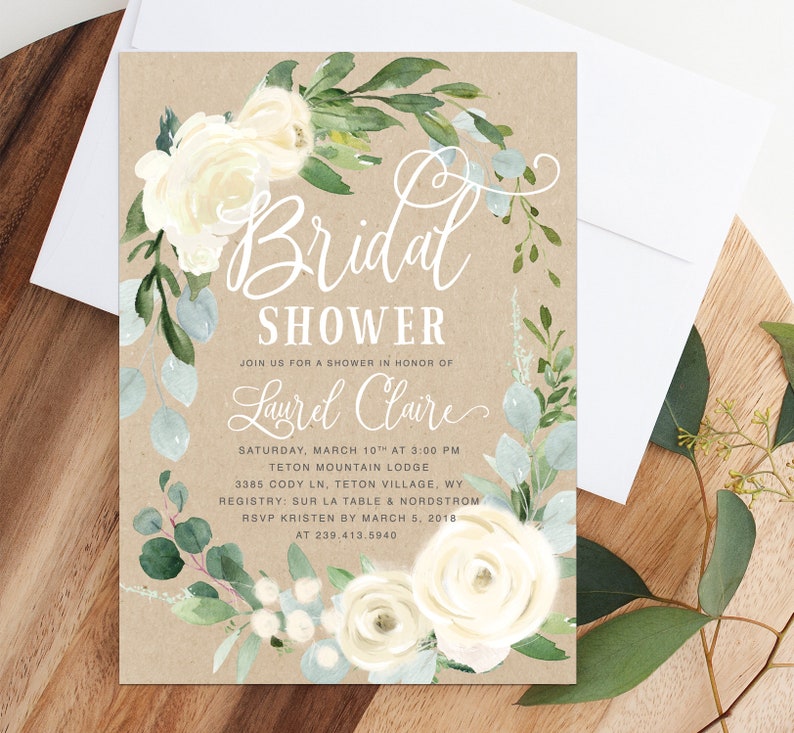 K&ouml;nnte beinhalten: Eine rustikale braune Einladung mit wei&szlig;en floralen Akzenten und dem Text "Bridal Shower" in wei&szlig;er kursivschrift. Die Einladung ist f&uuml;r eine Brautparty zu Ehren von Laurel Claire. Die Veranstaltung findet am Samstag, den 10. M&auml;rz um 15:00 Uhr im Teton Mountain Lodge, 3385 Cody Ln, Teton Village, WY statt. Die Wunschliste ist bei Sur La Table und Nordstrom. Bitte melde dich bis zum 5. M&auml;rz 2018 bei Kristen unter 239.413.5940.