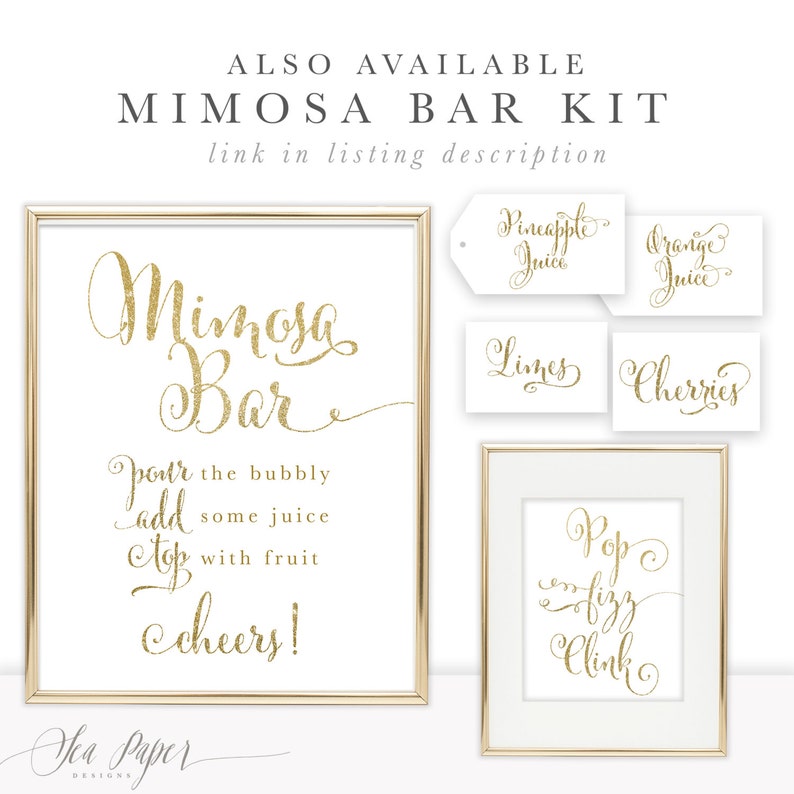 Peut inclure: Un kit de bar &agrave; mimosas avec du texte dor&eacute; &agrave; paillettes sur fond blanc. Le kit comprend un grand panneau encadr&eacute; avec l'inscription "Mimosa Bar" et des panneaux plus petits pour le jus et les fruits. Le texte "Pop fizz clink" est &eacute;galement affich&eacute;.