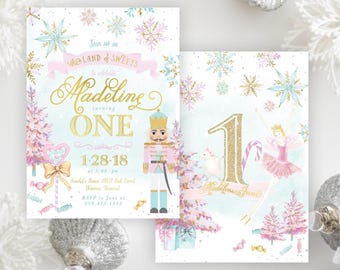 May include: Two rectangular party invitations featuring a nutcracker, a ballerina, pink trees, and snowflakes. The text reads: Join us in the LAND of SWEETS to celebrate Madeline turning ONE, 1-28-18 at 5:00 PM, and RSVP to Jane at 239.423.1435.