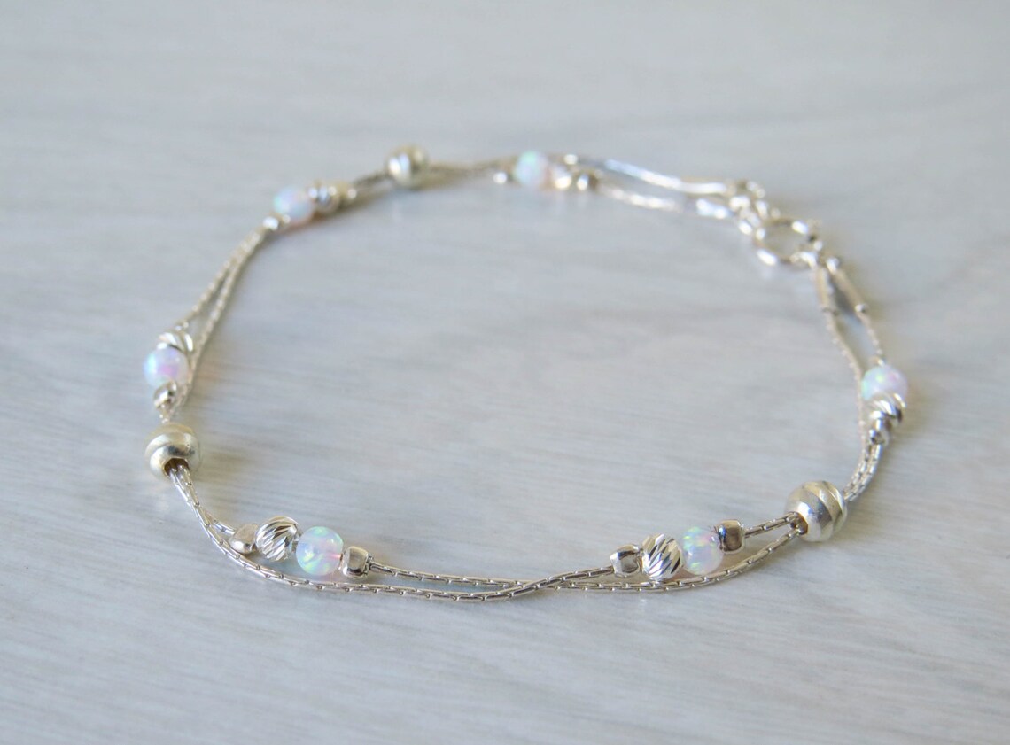 Elegant Golden Bracelet with White Opal main image 1