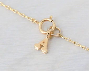 Add a personalized letter charm