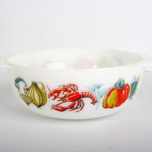 May include: White, round serving bowl with two handles. The bowl features colourful illustrations of a lobster, vegetables, and mushrooms. The bowl is made of a durable material and is suitable for serving various dishes.
