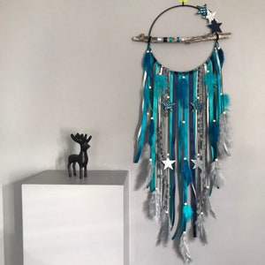 Driftwood dreamcatcher in duck blue, silver and navy blue with stars