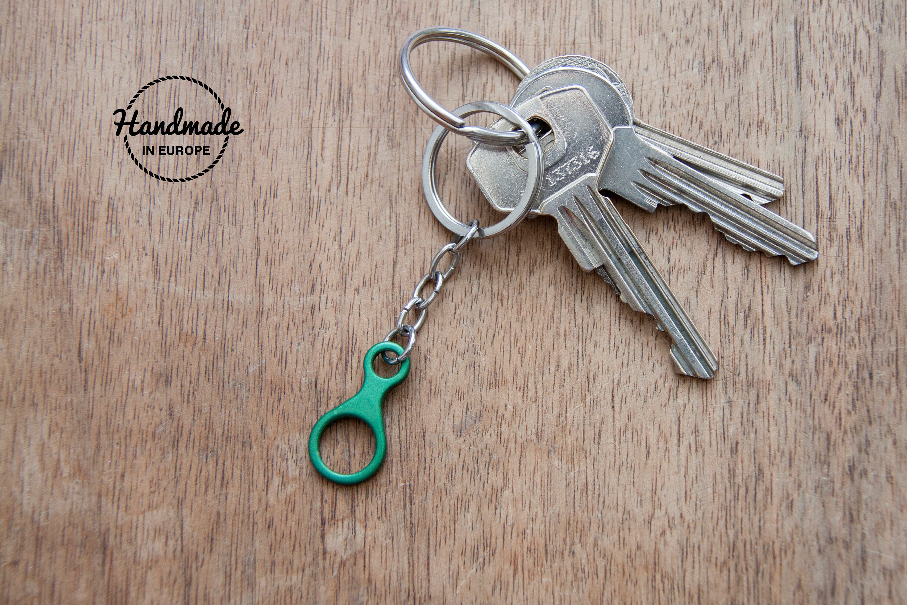 Porte clé forme decendeur en huit - Boutique : Porte clé et gadget - Vue  d'en Haut - École et Cours d'escalade