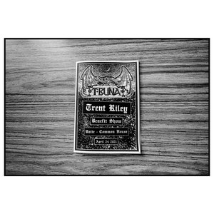 May include: Black and white flyer with a winged creature graphic and the text "TRUNA" at the top. The flyer advertises a "Trent Riley Benefit Show" at "Unite - Common House" on "April 24, 2021".