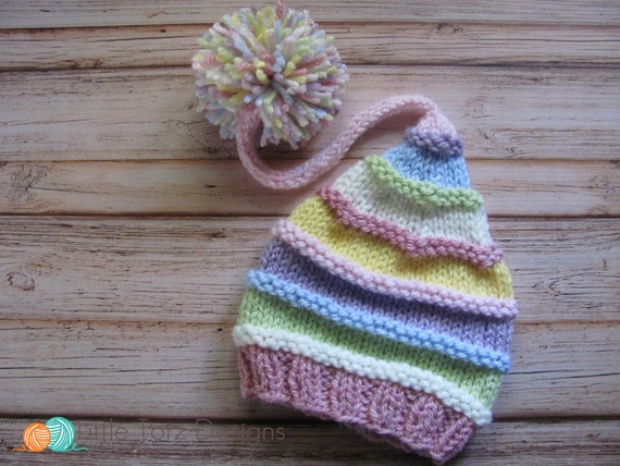 Long Tail Pom Pom Hat With Ridges Knitting Pattern Newborn - Main Image