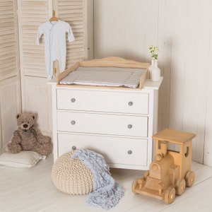 cot and changing unit