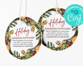 May include: Two round, white gift tags with a green, red, and orange watercolor wreath design. The text "Holiday" is written in red cursive font. The text "Simmering Potpourri" is written in black font. The text "Add all ingredients to a sauce pan, cover with 2 c. of water, simmer on low heat, add water as needed. Homemade by Jennifer" is written in black font.