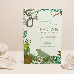 May include: A green and white jungle-themed birthday invitation for Declan's 8th birthday party. The invitation features a snake, a frog, a turtle, a lizard, and a poison dart frog. The text on the invitation reads "Slither, crawl or hop on over... Declan is turning eight. Join us to celebrate September 15, 2023 at 5:00pm Declan's House 1012 Pacific Way Laguna, CA RSVP to Declan's Mum at 555-1234"
