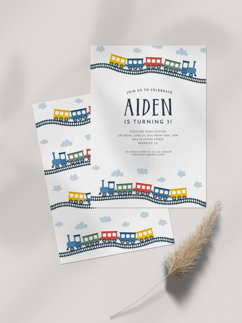 May include: A blue train with colorful cars on a white background. The text "JOIN US TO CELEBRATE AIDEN IS TURNING 3!" is at the top of the invitation. The invitation also includes the date, time, and location of the party.