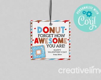 May include: A white gift tag with red, brown, and blue stripes. The tag features a donut with blue frosting and red sprinkles. The text on the tag reads "DONUT FORGET HOW AWESOME YOU ARE! HAPPY VALENTINE'S DAY from, Oliver".