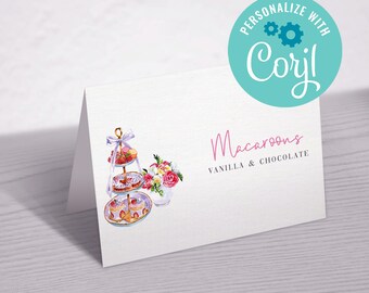 Puede incluir: Una tarjeta blanca con una ilustración de acuarela de un soporte de postre de varios niveles con macarons y un ramo de flores. La tarjeta también presenta el texto "Macarons Vainilla & Chocolate" y un círculo turquesa con el texto "Personalizar con Corjl".