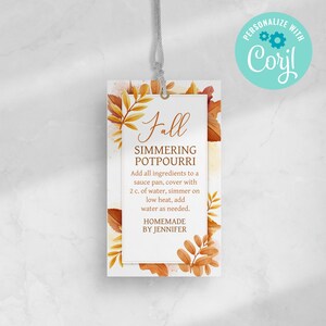 May include: A rectangular tag with the text "Fall Simmering Potpourri" in a decorative font, surrounded by autumn leaves in shades of orange and brown. The tag includes instructions and the name "Homemade by Jennifer."