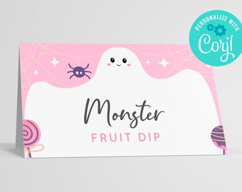 May include: Pink and white printable food label with a ghost, spider, and web design. The text reads "Monster Fruit Dip".