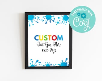 Op de afbeelding: Een ingelijst bord van 20,3 x 25,4 cm met een witte achtergrond en blauwe verfspatten rond de rand. Het bord zegt "CUSTOM" in kleurrijke letters en "Text Goes Here" in zwarte cursieve letters. Het bord zegt ook "8x10 Sign" in zwarte tekst.