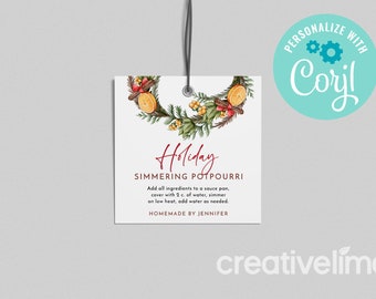 May include: A white gift tag with a watercolor illustration of a holiday wreath with cinnamon sticks, oranges, and berries. The text reads "Holiday Simmering Potpourri" and includes instructions for use. The tag is labeled "Homemade by Jennifer".