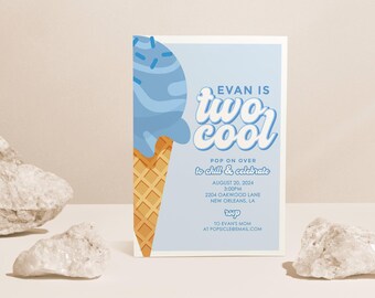 May include: A blue and white ice cream cone with sprinkles on top. The text "EVAN IS two cool" is written in blue and white on a light blue background. The invitation says "Pop on over to chill & celebrate" and includes the date, time, address, and RSVP information.