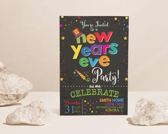 May include: A New Year's Eve party invitation with colourful text on a black background. The invitation includes the text "You're Invited to a New Years Eve Party!" and event details. The design features stars and a party horn.