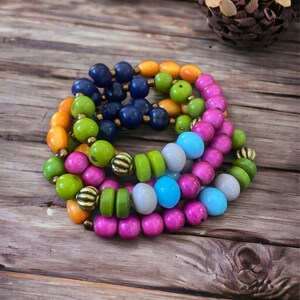 Bransoletka Dahlia| Bransoletka Tagua i nasiona Acai| Niebieski, Fuksja, Zielony, Turkusowy i Szafranowo-Żółty| Bransoletka Stack| Biżuteria Tagua