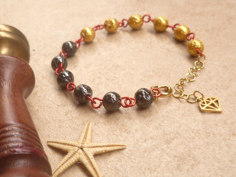 Golden starfishes long earrings with red coral and lava stone black beads