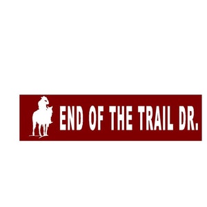 End of trail cowboy Street sign