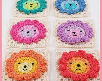 May include: Six crocheted lion squares in different colors. The squares are made with a white background and a colorful lion face in the center. The lion faces are in shades of green, blue, pink, purple, orange, and red.