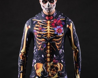 May include: A person wearing a black and gold skeleton costume with floral accents. The costume features a skull and snakes.