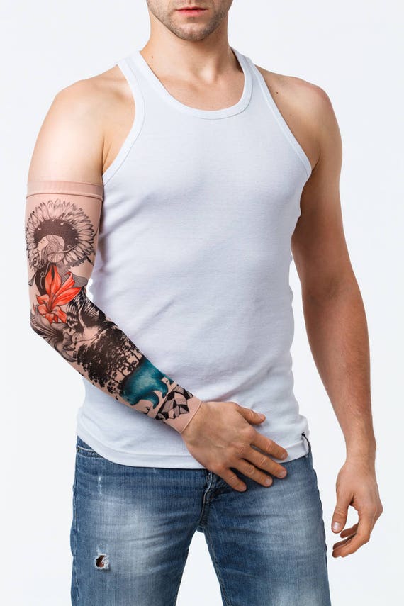 Colorful full sleeve tattoo w animals and nature scene