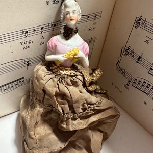 Antique porcelain half doll pin cushion - c.1890/1900