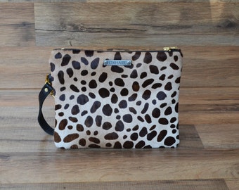 Poignet en poils de veau / Pochette en cuir de cheveux de poney