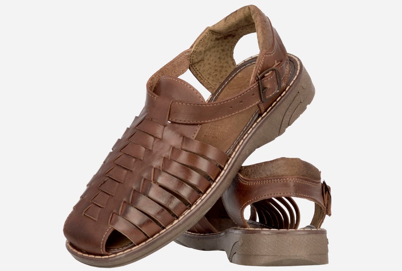 black gucci slides with gold g