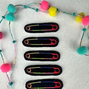 May include: A white ceramic mug with a black handle and the text "But First, Coffee" in a black, bold font. The mug is on a white surface.