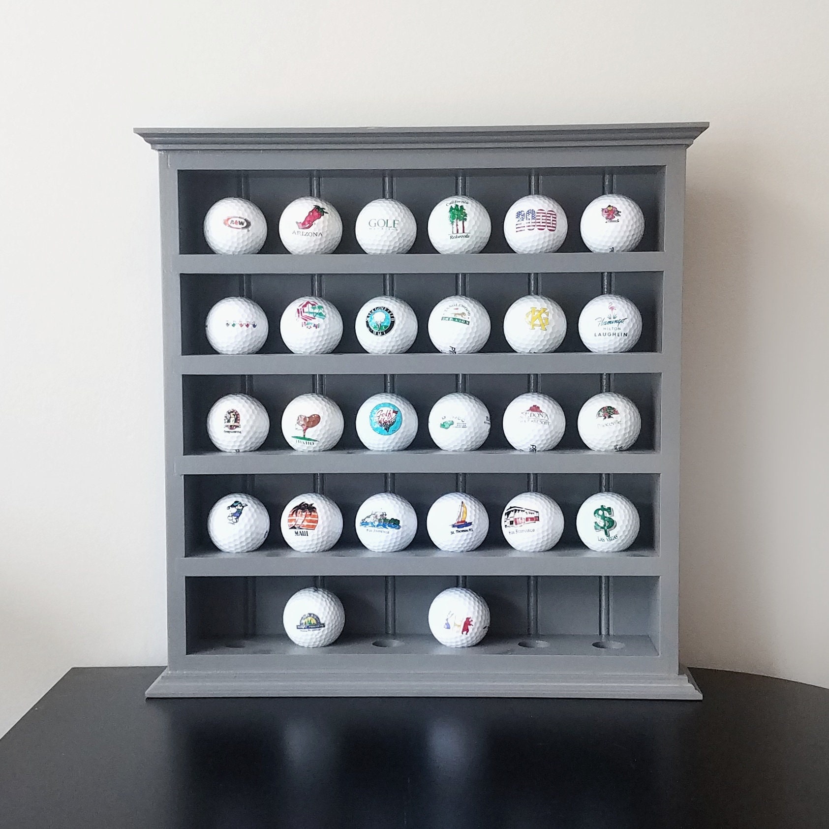 Golf ball display case deals