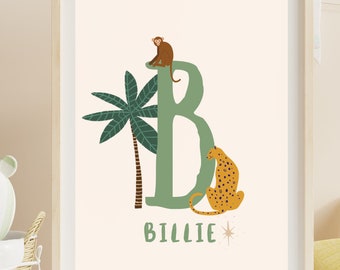 May include: A green letter B with a monkey sitting on top and a leopard sitting next to it. A palm tree is to the left of the letter. The name "Billie" is written below the letter.