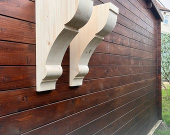 A pair of extra large pine wood  corbels