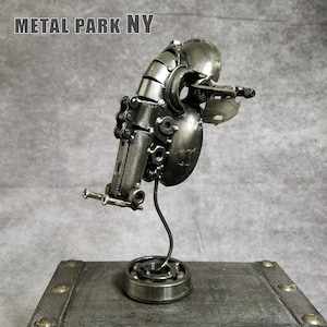 Handmade metal art, Scrap metal Slave Spaceship, Made out of car parts , Recycled metal art