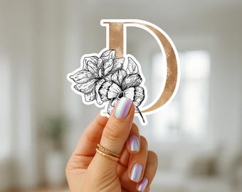 Adesivo floreale con lettera D dorata: elegante decalcomania in vinile con iniziale