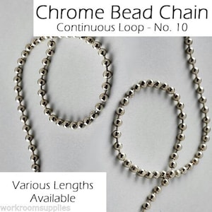 May include: Chrome bead chain in a continuous loop, available in various lengths. The chain is made of silver-toned metal beads. The image shows two loops of the chain.