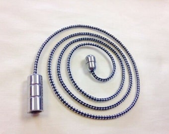 Chrome barrel light pull with black and white cord