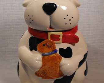 CKA Ceramic Dog Style Cookie Treat Jar Black and White Red Collar Holding Brown Puppy 10 1/2 inches high