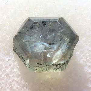 7.71ct Montana Sapphire Buff Top Facet & Left Rough On The Other Side