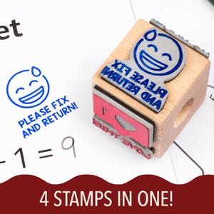 May include: A wooden stamp with a blue and silver emoji design that says "PLEASE FIX AND RETURN!" The stamp is on a white surface with math problems. The text "4 STAMPS IN ONE!" is at the bottom.