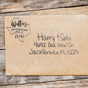 May include: A tan envelope with handwritten addresses. The return address includes the name "Walters" inside a Texas outline, with the address "1888 Dunedin Road, Paris, TX 65460." The recipient's address is "Harry & Sally, 4692 Oak View Dr, Jacksonville, FL 32291."