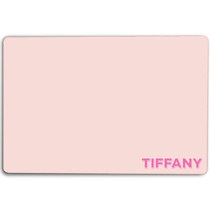 May include: A light pink personalized mousepad with the name "TIFFANY" printed in pink.