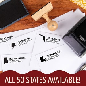 May include: A set of five personalized return address stamps featuring different state outlines. The stamps are printed on white paper with black ink. The text on the stamps includes names, addresses, and states. The text "ALL 50 STATES AVAILABLE!" is printed in white on a red wavy background.