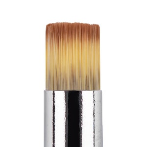 May include: Close-up of a small, round paint brush with a silver handle and brown and beige bristles.