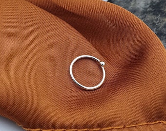 Handmade Minimalist Silver Nose Ring, 0.8mm (20 Gauge). Simple Multi-functional Hoop, can be worn as an Earring. Twist to Open & Close.