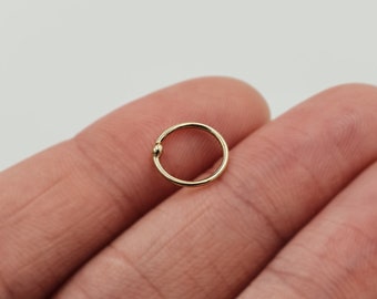 Solid 9ct Gold Hoop, Handmade Minimalist Fine Eco Nose Ring. 0.8mm (20g). Multi-functional, can be worn as an Earring. Twist to Open & Close
